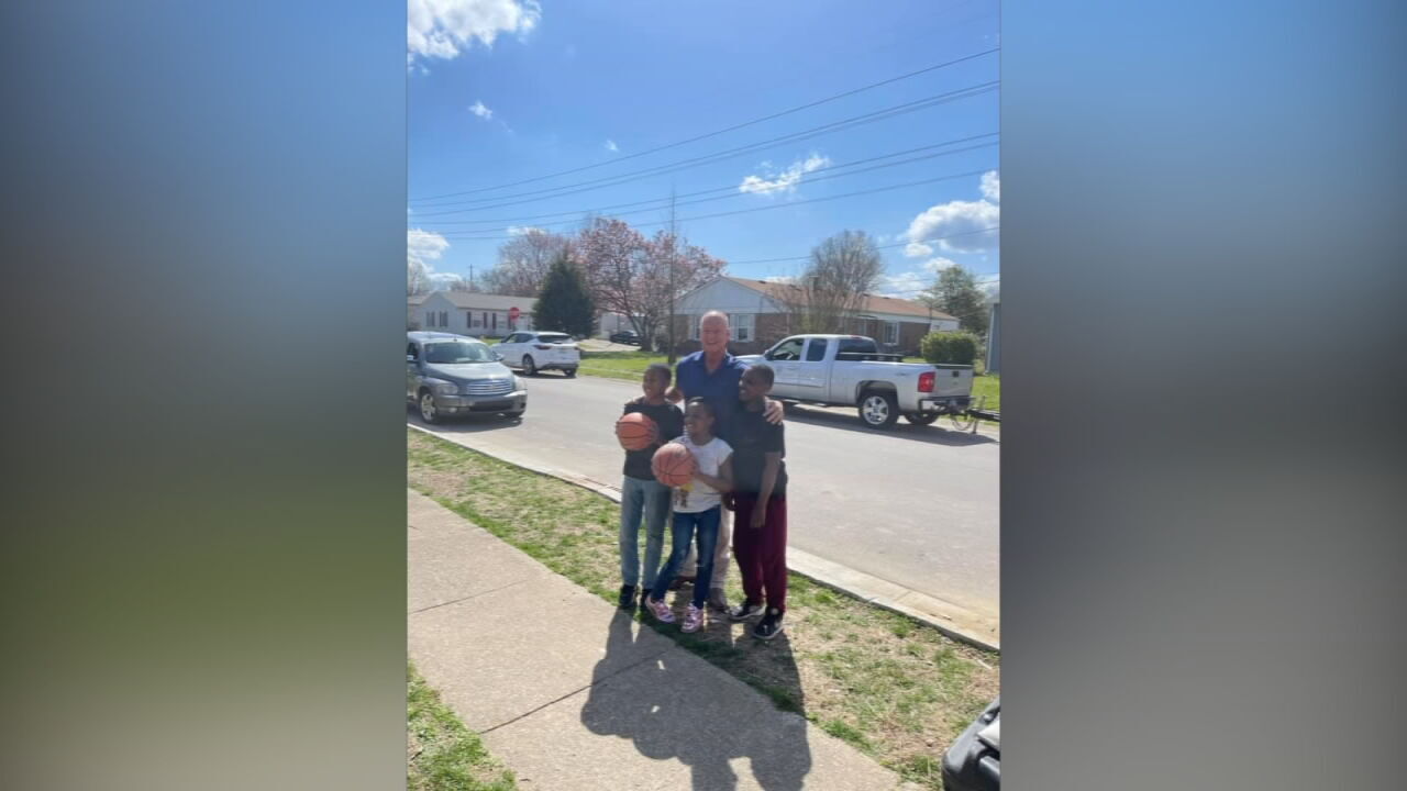 Jeffersonville mayor, police donate basketball goal-pickup game (2).jpeg